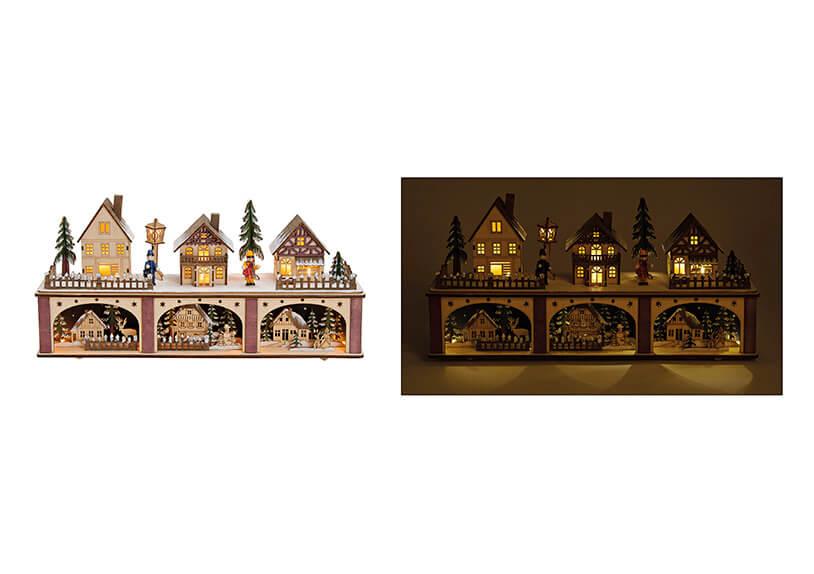 Village illuminé enneigé